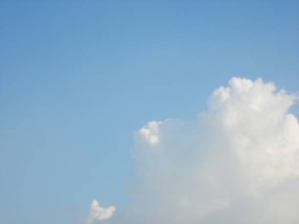 istock The skies above with white cloud. 880934182
