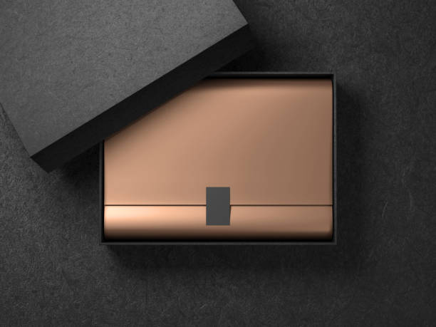 Black Box with Golden wrapping paper and label sticker. Horizontal