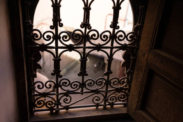 istock street scene in marrakesh looked through iron window 880942976