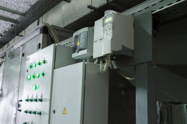 istock Two closed ventilation system control cabinets in the industrial ventilation room 880944764