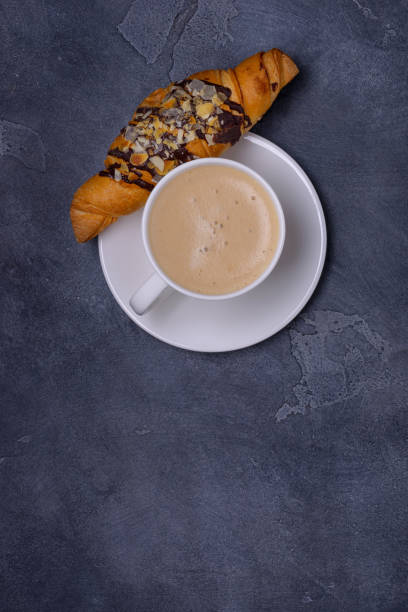 istock Cofeee and croissants for perfect breacfast 880960002