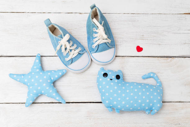istock Children's sneakers and toys. Flat lay 880960074