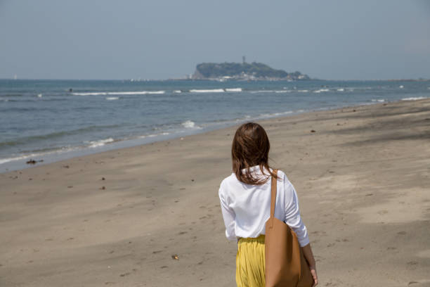 istock A beautiful woman sightseeing in Kamakura 880960460