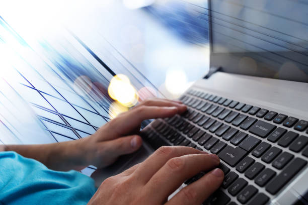 istock Man's hands typing on laptop notebook keyboard in the office. Man browsing information on internet. Freelance blogging, it support concept 880963634