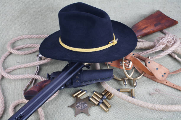 istock Wild west rifle, ammunition and sheriff badge 880966220