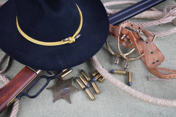 istock Wild west rifle, ammunition and sheriff badge 880966840