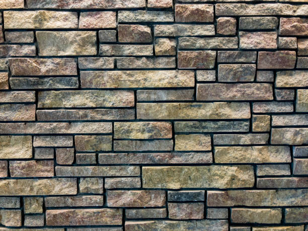 istock A beautiful stone wall inside a modern office building makes a wonderful background 880968954