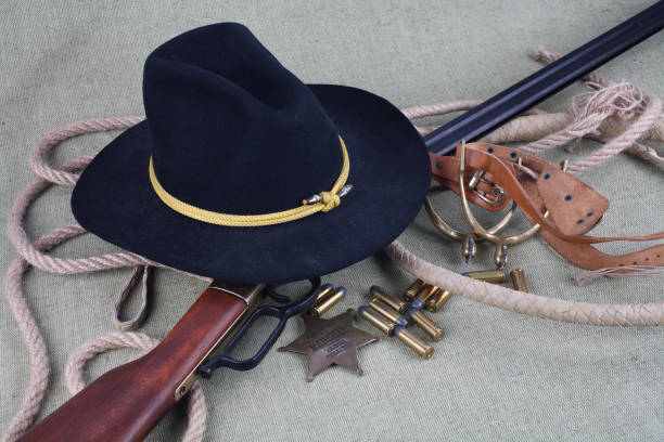 istock Wild west rifle, ammunition and sheriff badge 880969468