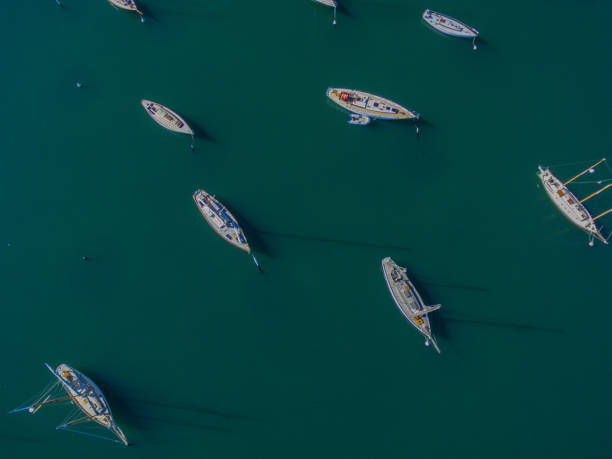 istock sailboats and powerboats make interesting patterns in the waters around Vineyard Haven on Martha's Vineyard as seen from above 880969524