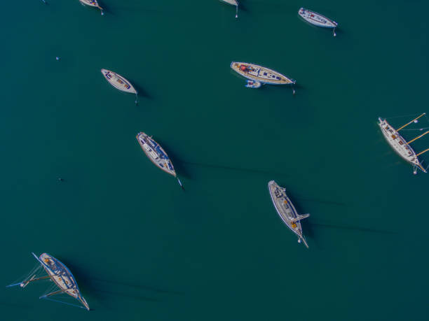istock sailboats and powerboats make interesting patterns in the waters around Vineyard Haven on Martha's Vineyard as seen from above 880969620