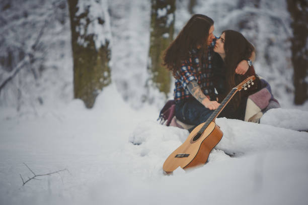 istock Man plays guitar to his girlfriend 880974816