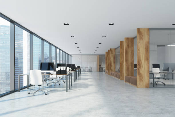 istock White and wooden open space office interior 880985540