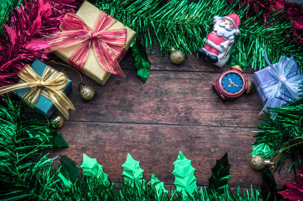 istock christmas background  decoration on dark wooden board 880988666