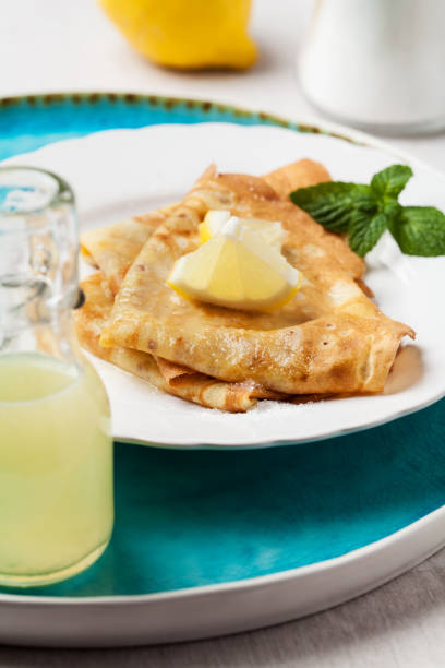 istock English-style pancakes with lemon and sugar 880994256