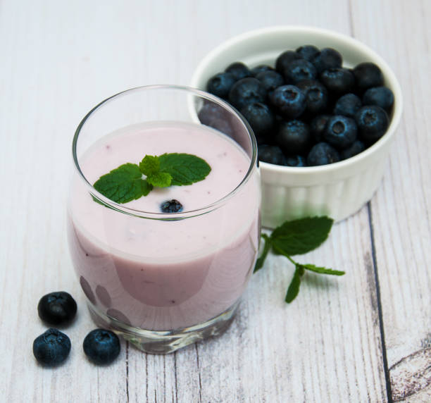 istock Glass with blueberry yogurt 880996974