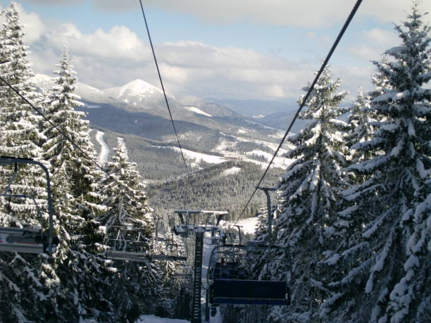 istock Ski lift on the Bukovel spa in the Carpatian mountains. 880997420
