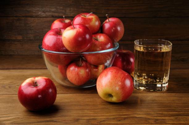 istock Apples and Glass of Cider 881013576