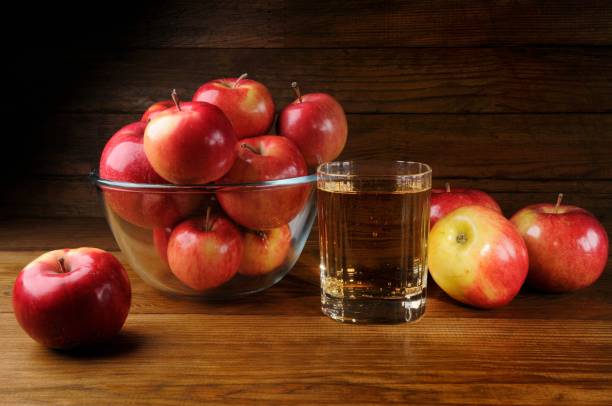 istock Apples and Glass of Cider 881013596