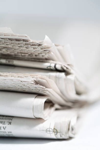istock newspaper isolated on white background - Stock Image 881016330