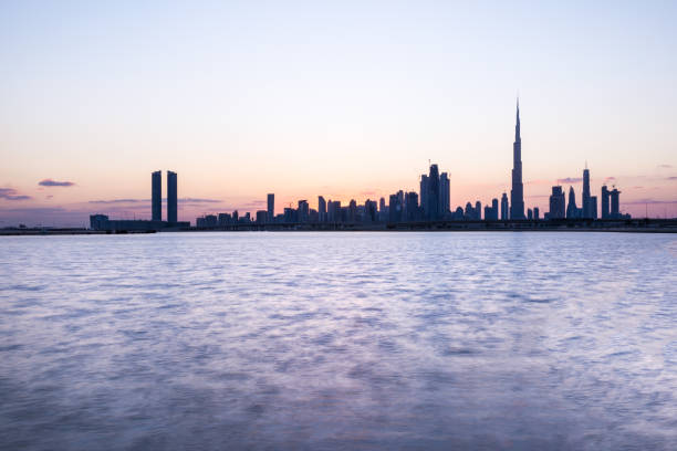 istock Silhouette of Dubai Downtown at sunset. 881016650