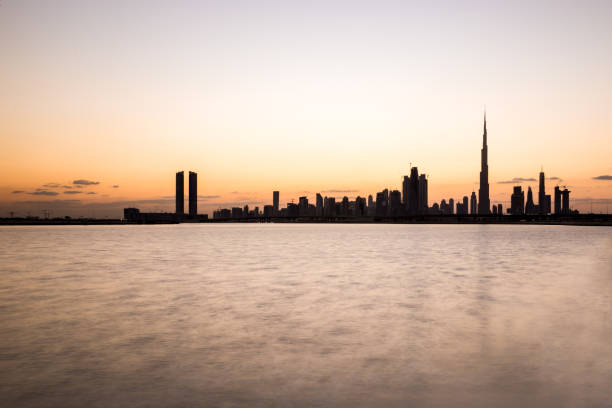 istock Silhouette of Dubai Downtown at sunset. 881016660