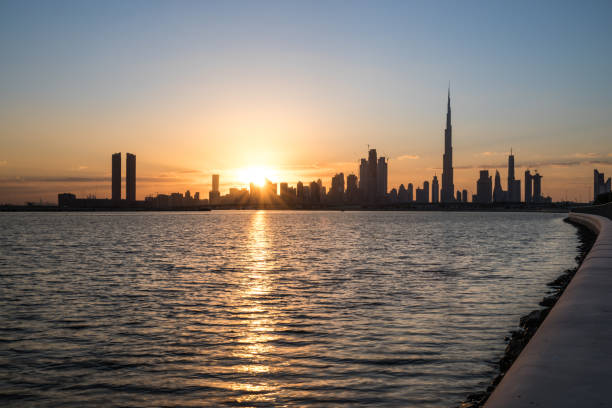 istock Silhouette of Dubai Downtown at sunset. 881016662
