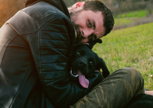 istock man with dog have a fun 881020618