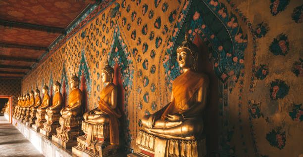 istock Row of Buddhas in a temple 881031214