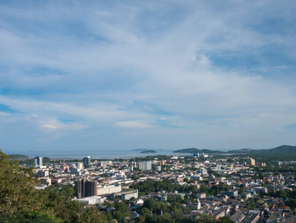 istock cloudy blue sky background and cityscape from the viewpoint on hilltop 881041332