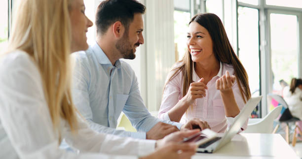 istock Business colleagues laughing 881048212