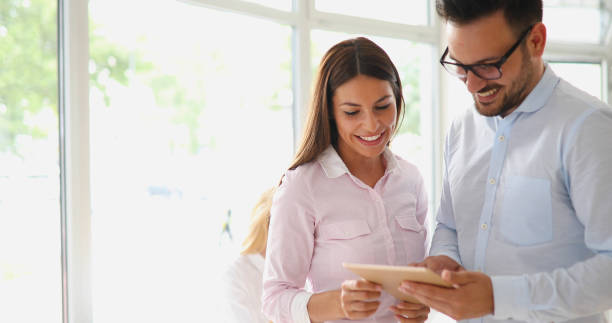 istock Business colleagues working together at office 881048638