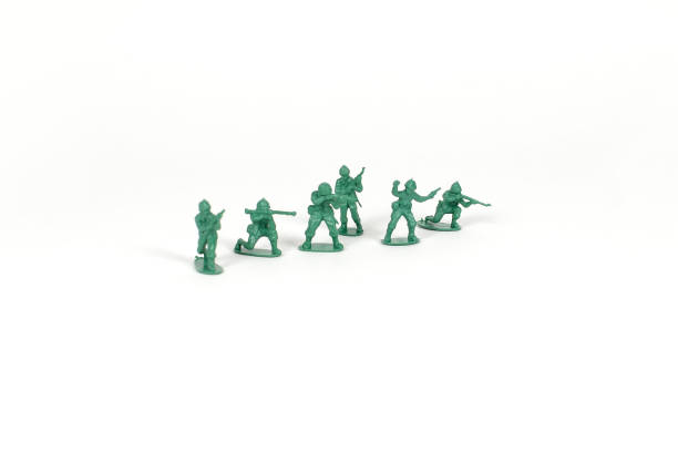 istock Green toy soldiers 881049434