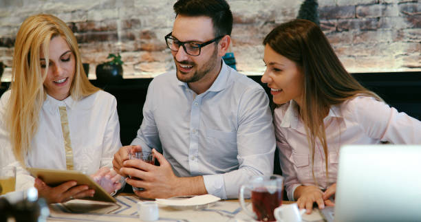 istock Happy colleagues casual chat at the office 881049442