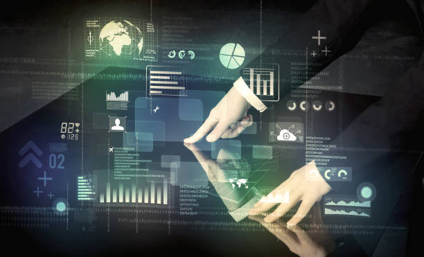 istock Businessman touching interactive modern desk with technology icons 881051522