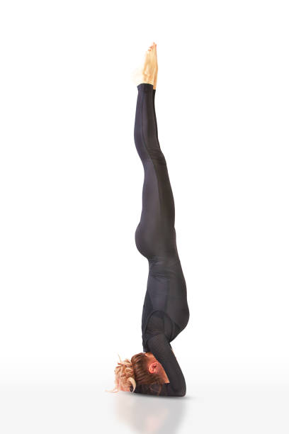 istock beautiful flexible woman doing yoga poses on white 881053614