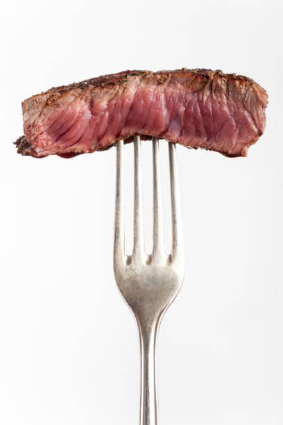 istock piece of grilled steak on a fork 881059518