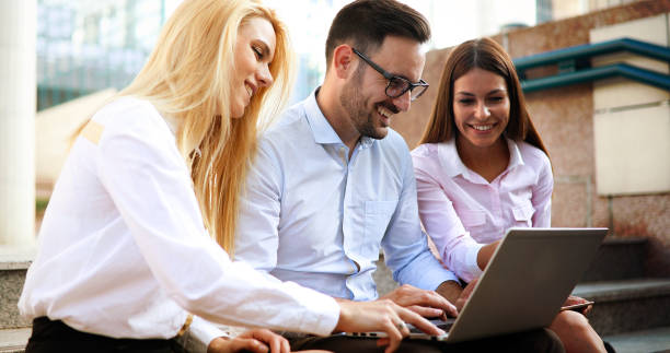 istock Happy colleagues casual chat at the office 881059636