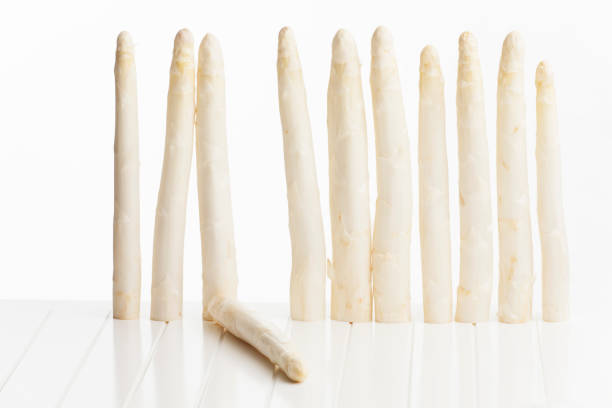 istock row of white asparagus 881059952