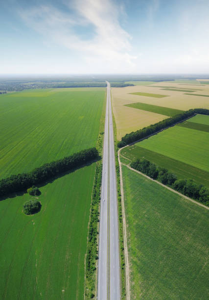 istock Long road line as a backrgound. Concept and idea from drone 881061124