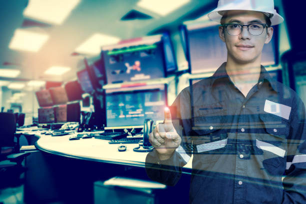 istock Double exposure of  Engineer or Technician man in working shirt press his finger for new innovation with group of computers room background, business and industry concept. 881068062