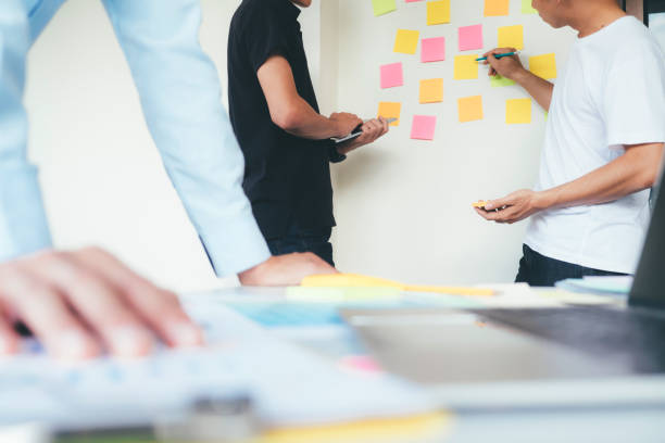 istock Designers brainstorming meeting team. 881073212