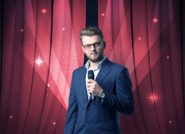 istock Businessman holding microphone 881074024