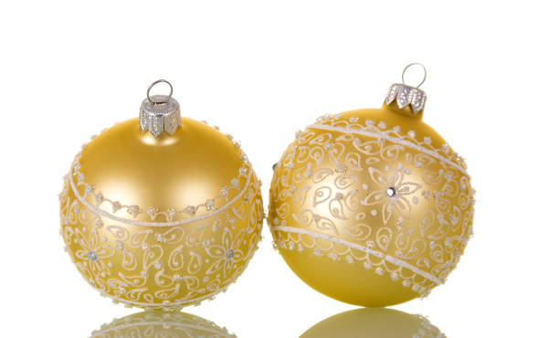 istock Two beige Christmas ball ornaments and crystals, isolated on white 881084750