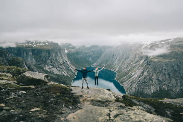 istock couple  hikers on mountain, Besseggen Ridge 881089324
