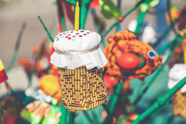 istock toy in form of cake hanging on tree branch 881089332