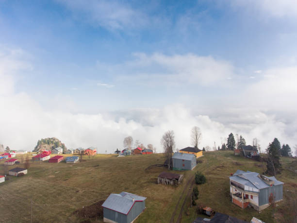 istock Aerial view of mountain village under clouds 881102976