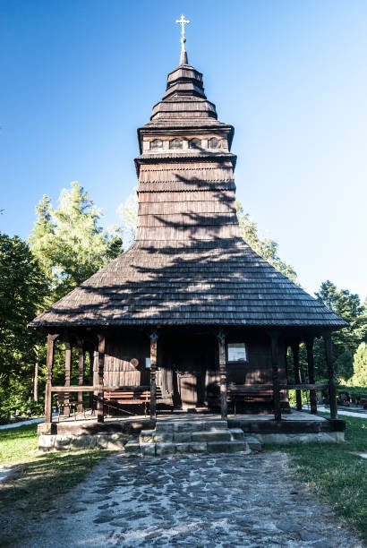 wooden church on Kuncice pod Ondrejnikem in Czech republic wooden church of sv. Prokop and Barbora in Kuncice pod Ondrejnikem village in Moravskoslezske Beskydy mountains in Czech republic during nice day with clear sky moravian silesian beskids photos stock pictures, royalty-free photos & images
