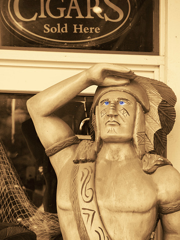 wooden indian in front of cigar store