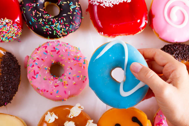 istock sweet doughnuts on gray stone background 881147420