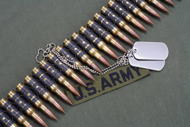 istock ammunition belt on US ARMY uniform background 881175318